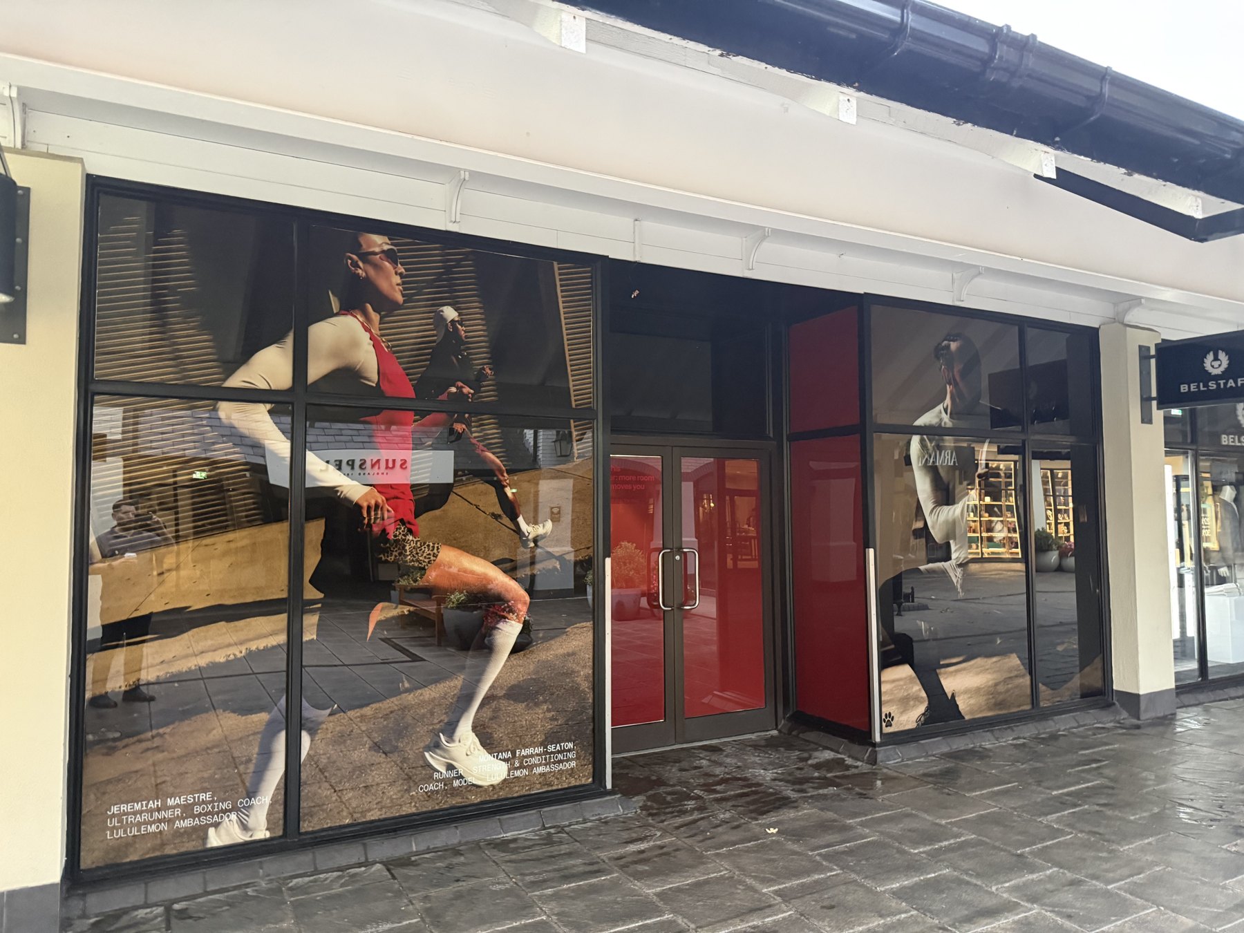 Lululemon window vinyls. Large-format campaign window graphics across a retail frontage.